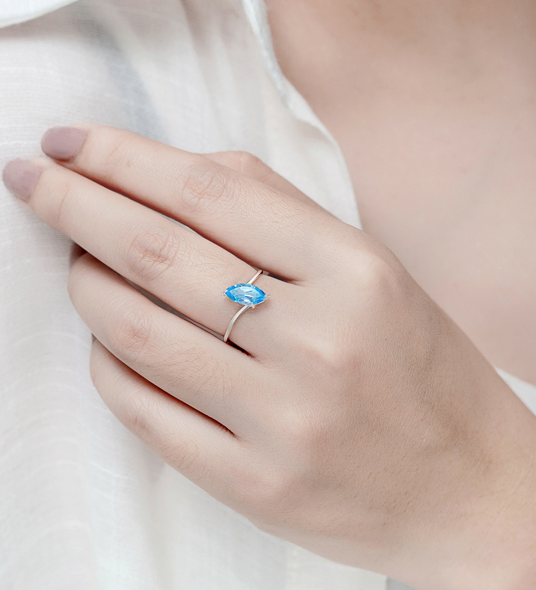 La Preciada - Wholesale 925 Sterling Silver Ring, Decorated with Swiss Blue Topaz. Handcrafted. The Angle of the Stone May Vary. - SKU #1063-4696A
